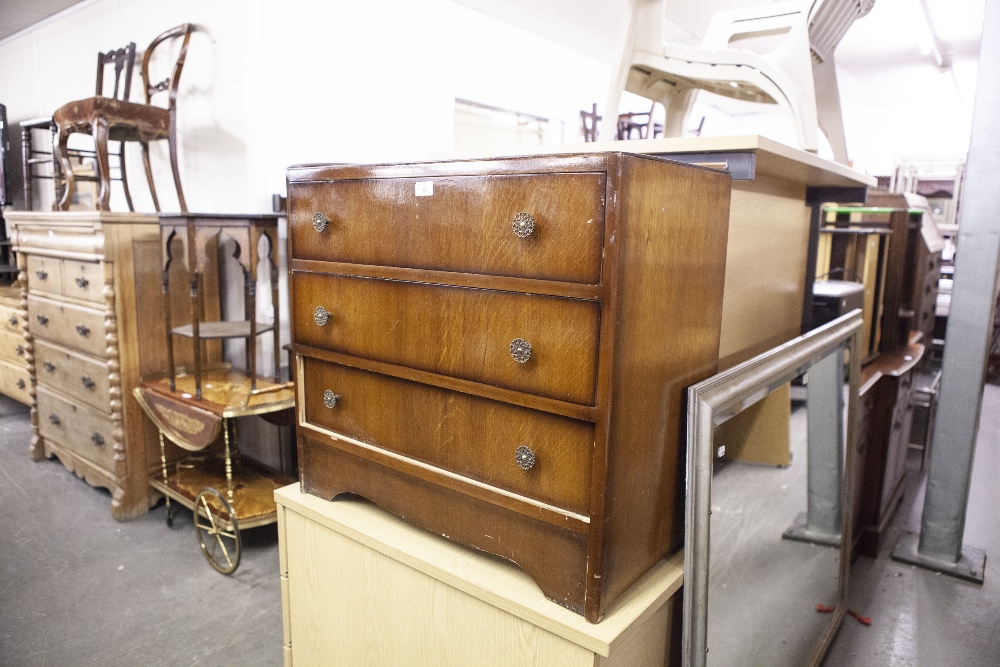 A SMALL WALNUTWOOD CHEST OF THREE DRAWERS