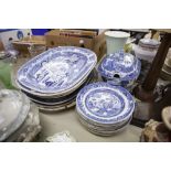 ELEVEN NINETEENTH CENTURY PRINTED BLUE AND WHITE WILLOW PATTERN POTTERY PLATES, 9 1/2" DIAMETER,