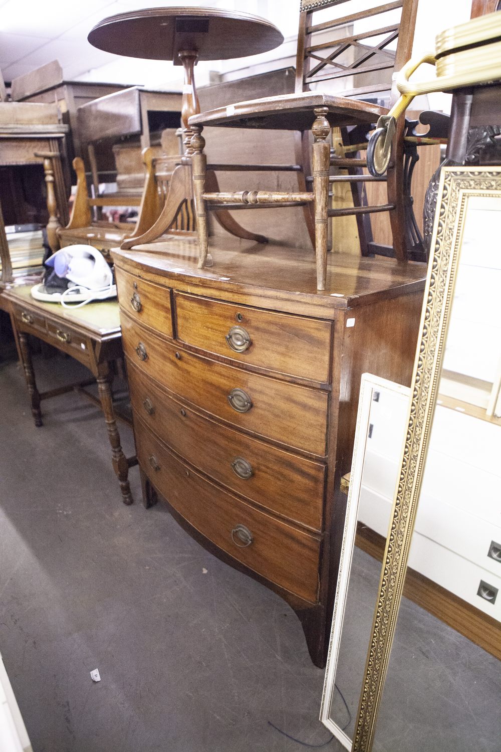 NINETEENTH CENTURY MAHOGANY BOW FRONTED CHEST OF TWO SHORT AND THREE LONG DRAWERS