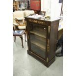 A MAHOGANY INLAID PIER CABINET WITH BRASS DECORATION