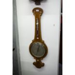 A LATE VICTORIAN WALNUTWOOD BANJO BAROMETER AND THERMOMETER WITH ENGRAVED SILVERED DIAL, 3'6" HIGH