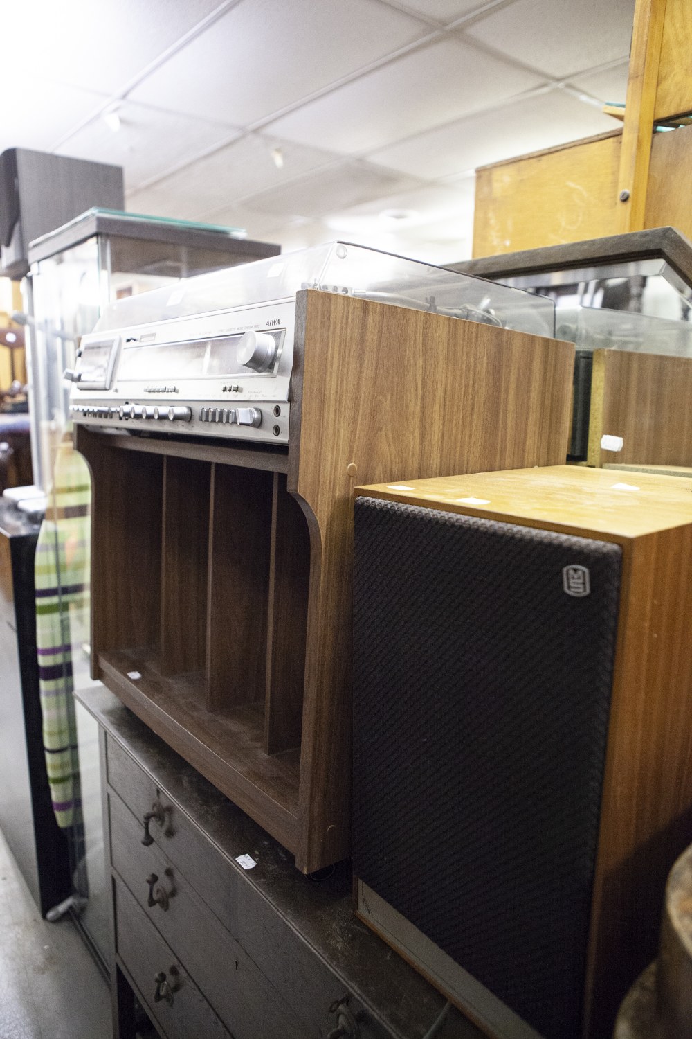 AIWA STEREO CASSETTE MUSIC SYSTEM 5600, ON RECORD STAND WITH TWO SPEAKERS