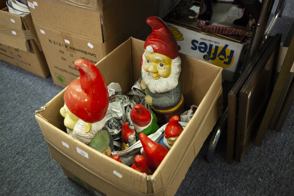 TWO LARGE GARDEN GNOMES AND SIX SMALL GARDEN GNOMES