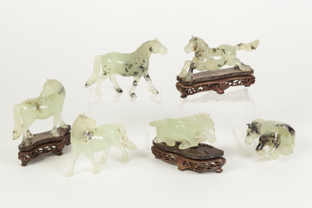 A SUITE OF SIX LATE NINETEENTH/EARLY TWENTIETH CENTURY CHINESE CARVED PALE GREEN HARDSTONE MODEL