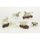 A SUITE OF SIX LATE NINETEENTH/EARLY TWENTIETH CENTURY CHINESE CARVED PALE GREEN HARDSTONE MODEL