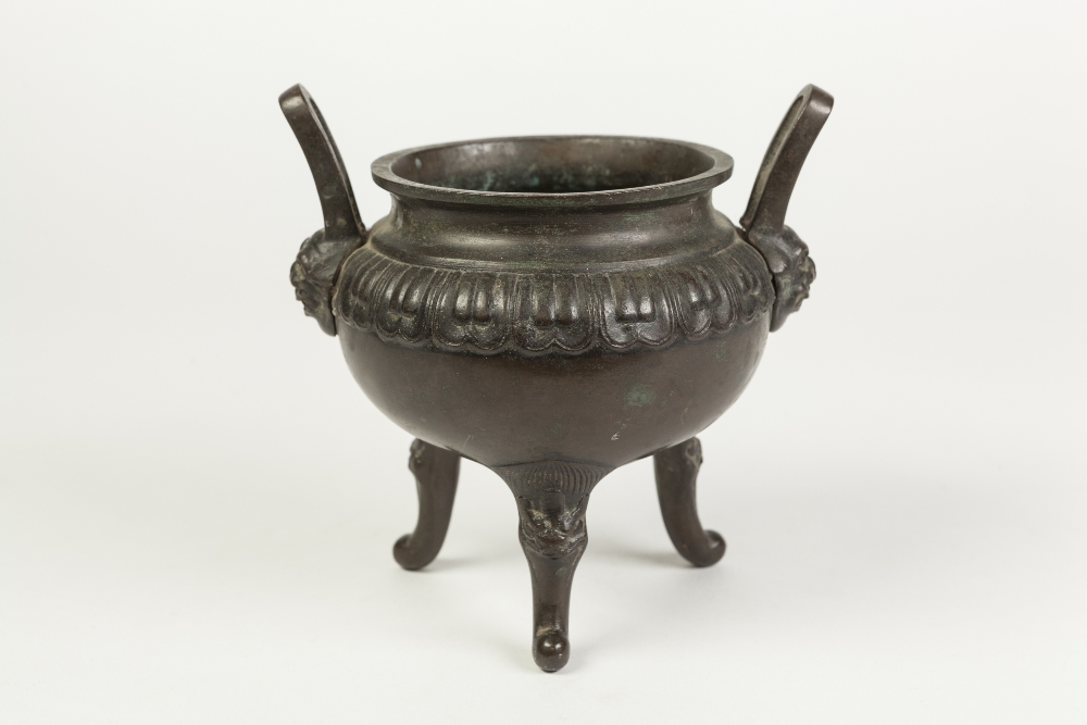 A CHINESE LATE QING DYNASTY TWO HANDED BRONZE INCENSE BURNER, the rectangular section loop handles