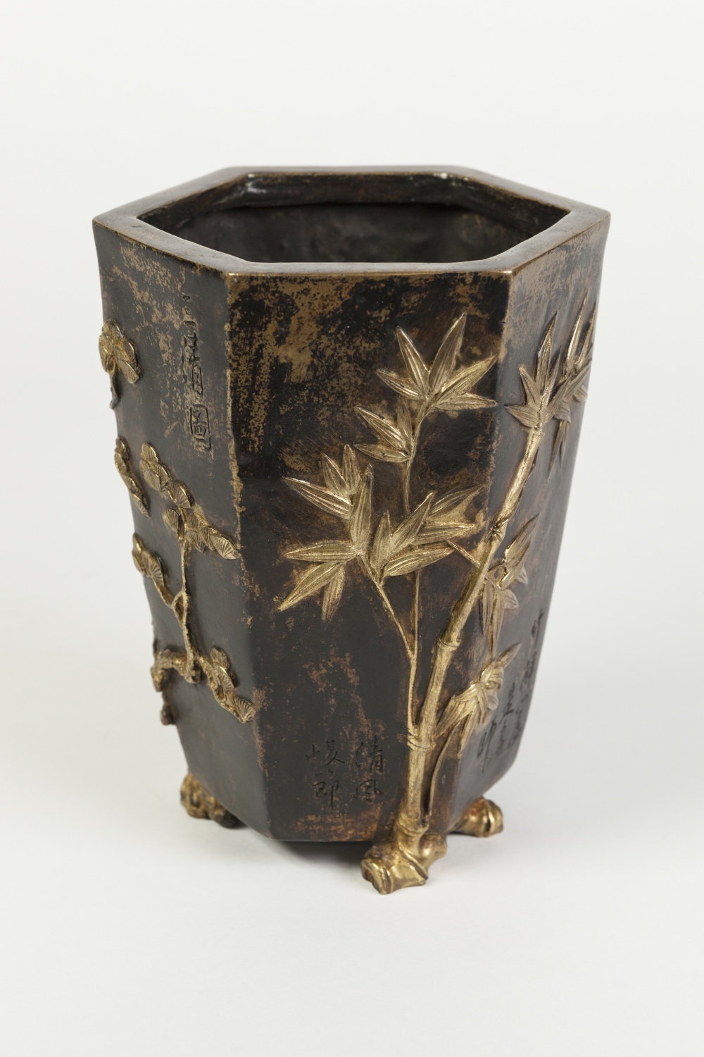 A GOOD CHINESE QING DYNASTY PATINATED AND PARCEL GILDED BRONZE HEXAGONAL TAPERED VASE, in case and