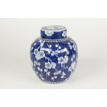 A LATE NINETEENTH CENTURY CHINESE PORCELAIN BLUE AND WHITE PRUNUS BLOSSOM DECORATED GINGER JAR