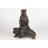 A RARE CHINESE MING DYNASTY PATINATED BRONZE FIGURE OF GUANYIN, the Buddhist Deity sat upon a