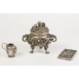 ORNATE CHINESE CAST WHITE METAL TWO HANDLED CENSER AND COVER, with all over high relief design of
