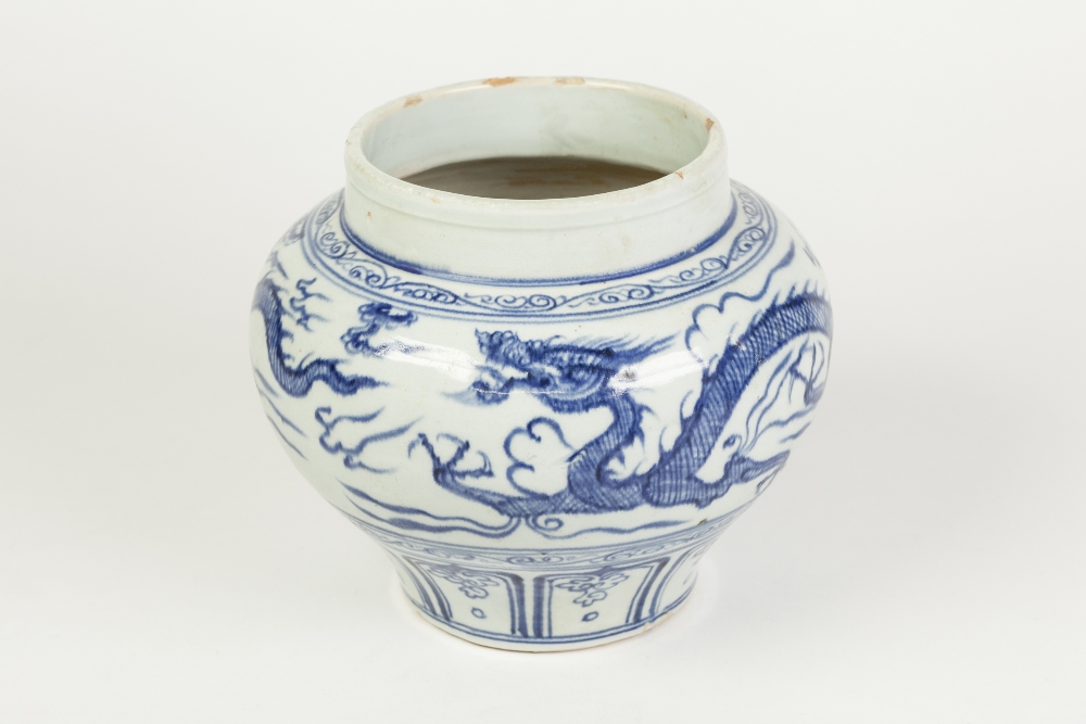 AN AGED PROBABLY KOREAN PORCELAIN SQUAT INVERTED BALUSTER SHAPE JAR, painted in a Ming dynasty style
