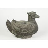 AN ARCHAIC BRONZE MODEL OF A DUCK, HAN DYNASTY. Naturalistically cast in a seated position,