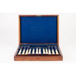 MID VICTORIAN WALNUTWOOD CASED SET OF 24 SILVER AND IVORY HANDLED FISH KNIVES AND FORKS, Sheffield