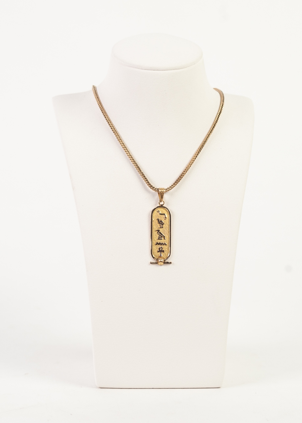 9k GOLD CHARM LINK NECKLACE, 15 1/2" long, 6.9gms and an EGYPTIAN GOLD COLOURED METAL ROUND OBLONG