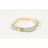 CHINESE 14k GOLD AND GREEN JADE HINGE OPENING BANGLE, 24.7gms gross