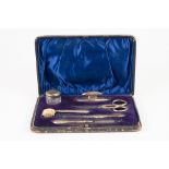 EDWARDIAN SILVER HANDLED MANICURE SET OF 6 PIECES, in fitted morocco case, Birmingham 1910
