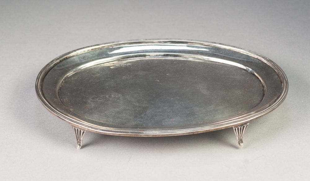 LATE VICTORIAN SILVER OVAL TEAPOT STAND OR CARD TRAY, plain with cavetto border and reeded edge,
