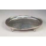 LATE VICTORIAN SILVER OVAL TEAPOT STAND OR CARD TRAY, plain with cavetto border and reeded edge,