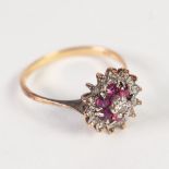 18ct GOLD, DIAMOND AND RUBY CIRCUALR THREE TIER CLUSTER RING, set with a small raised centre diamond