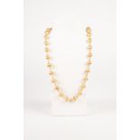 18ct GOLD SINGLE STRAND NECKLACE, with thirty six pumpkin shaped chain linked beads, one bead