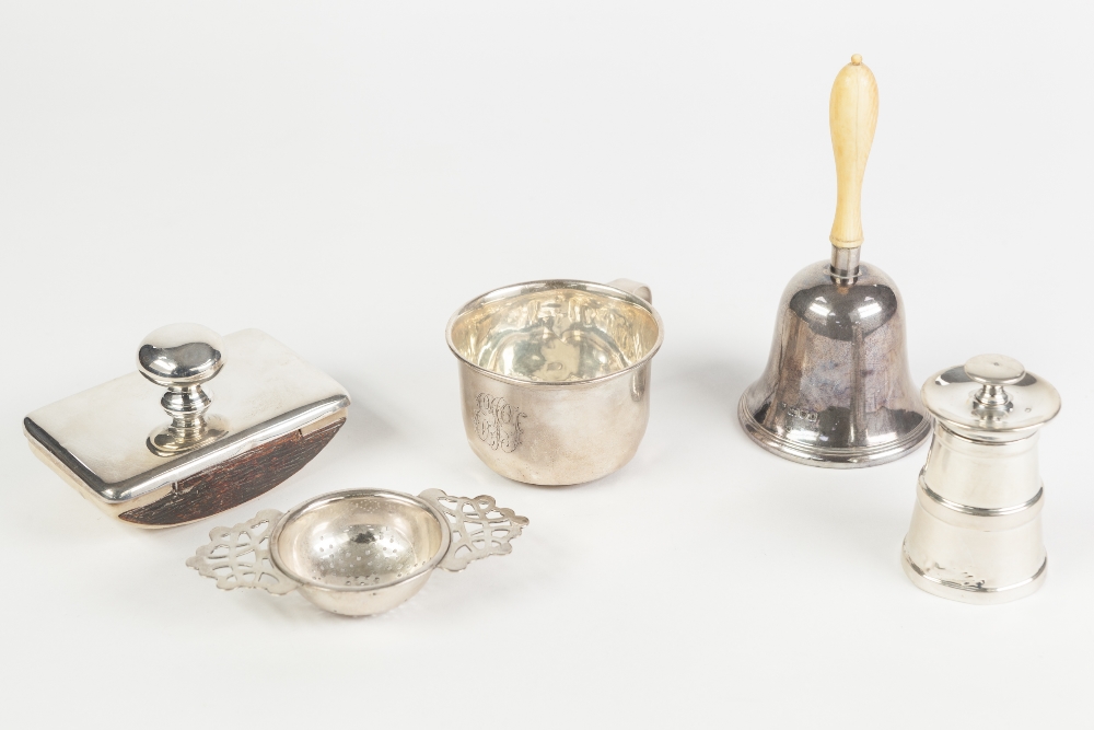 A SILVER PEPPER MILL, London 1939, TOGETHER WITH A SILVER IVORY HANDLED TABLE BELL, London 1909, A