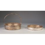 A CONTINENTAL SILVER COLOURED WHITE METAL HAND CRAFTED BASKET WEAVE CIRCULAR HANDLED SHALLOW