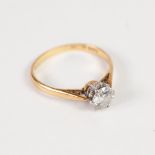 18ct GOLD AND PLATINUM RING, set with a raised round brilliant cut solitaire diamond, approx 3/