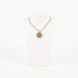 EDWARDIAN 9ct GOLD FLORAL AND SCROLL ENGRAVED CIRCULAR LOCKET PENDANT, 3/4" diameter, and the 9ct