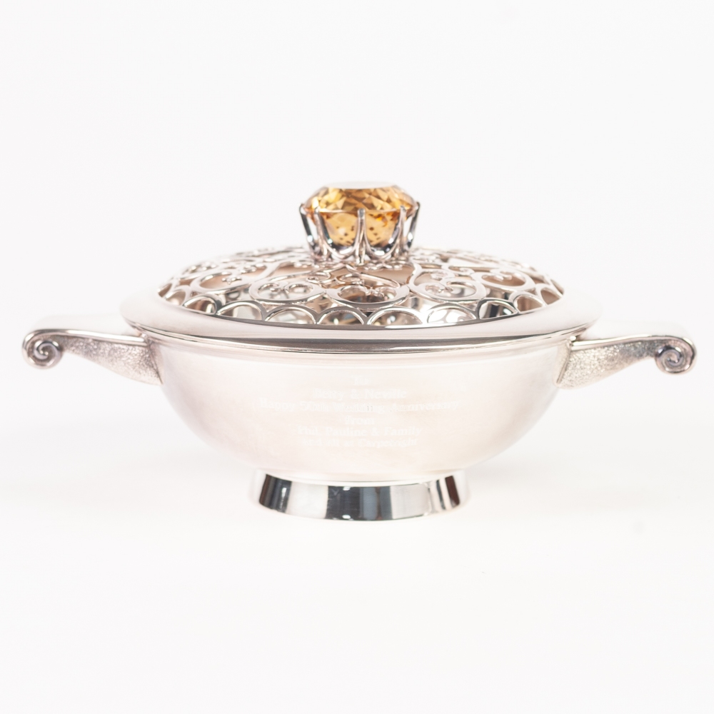 HAMILTON AND INCHES, SCOTTISH SILVER QUAICH SHAPED TWO HANDLED BOWL AND COVER, the cover low domed