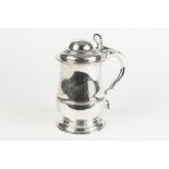 A GOOD GEORGE II SILVER BALUSTER TANKARD, the plain body with reeded girdle, the hinged moulded