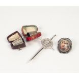 CONTINENTAL SILVER COLOURED METAL (800 mark) OVAL BROOCH framing an oval miniature of the Madonna