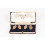 PAIR OF 9ct GOLD DOUBLE OVAL CUFFLINKS with engine turned decoration, Chester 1935, in case, 3.8gms