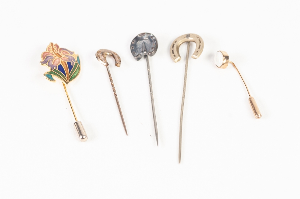 22ct GOLD STICK PIN, the top collect set with an oval opal; THREE STICK PINS with horseshoe