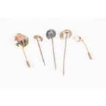 22ct GOLD STICK PIN, the top collect set with an oval opal; THREE STICK PINS with horseshoe