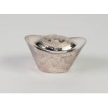 CHINESE SILVER COLOURED MEAT BOAT SHAPED ORNAMENT, the low domed top engraved with a Chinese