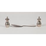 PAIR OF SILVER COLOURED METAL PEPERETTES, pyriform and semi lobed, 2 3/4" high (marked Sterling