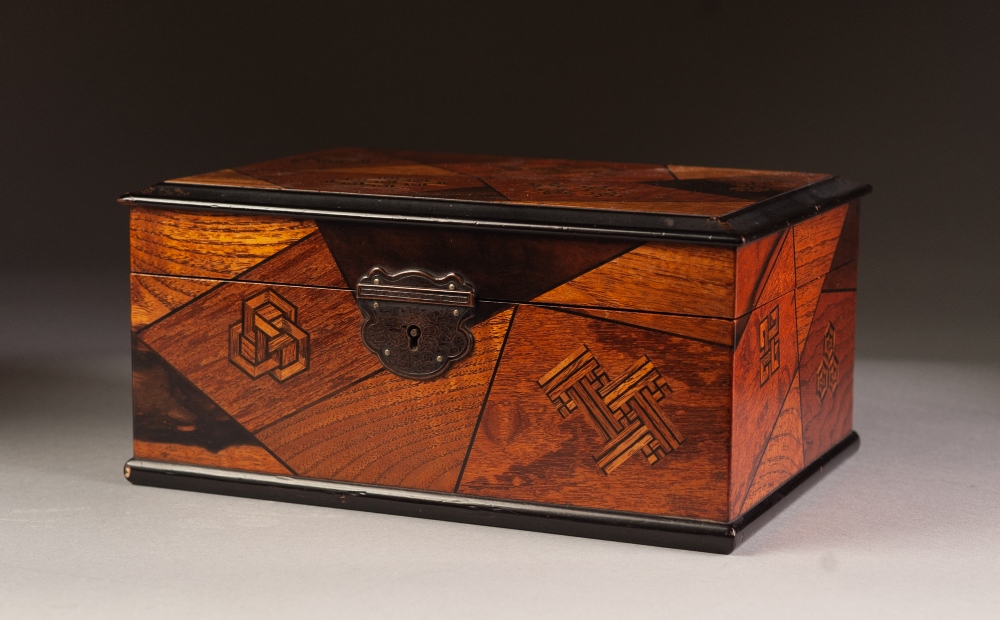 A JAPANESE LATE MEIJI PERIOD LACQUERED PARQUETRY AND MARQUETRY INLAID BOX, 8" (20.5cm) long