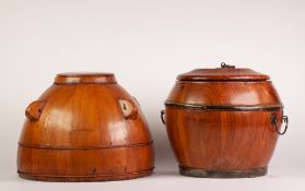 TWO CHINESE PINE WOOD RICE CONTAINERS AND COVERS, one brass mounted and with two handles, the