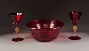 POSSIBLY WHITEFRIARS, STYLISH RUBY GLASS BOWL, of ribbed, flared form, 3 ¾" (9.5cm) high, 9" (22.