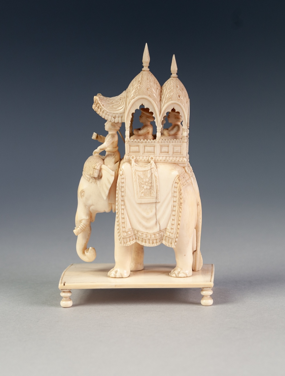EARLY TWENTIETH CENTURY INDIAN CARVED IVORY GROUP OF FIGURES IN A HOWDAH ON A CEREMONIAL ELEPHANT, - Image 3 of 7