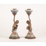 PAIR OF MODERN CHINESE POTTERY AND GILT METAL FRENCH STYLE FIGURAL CANDLE HOLDERS, each modelled