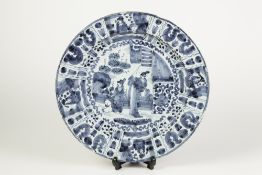 AN EARLY EIGHTEENTH CENTURY POSSIBLY LIVERPOOL DELFT WARE DISH, vibrantly painted in blue with