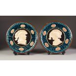 PAIR OF AUSTRIAN MAJOLICA POTTERY MOULDED WALL PLAQUES IN THE RENAISSANCE REVIVAL STYLE, each of