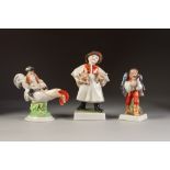 THREE HEREND, HUNGARIAN HAND PAINTED PORCELAIN FIGURES, comprising: BOY CARRYING TWO PIGLETS, MAN