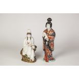 A JAPANESE MEIJI PERIOD ARITA PORCELAIN FIGURE holding a pet dog, polychrome enamelled and gilded 11