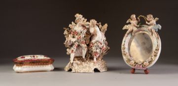 TWENTIETH CENTURY GERMAN PORCELAIN GROUP, painted in colours and gilt and modelled as a maid and her