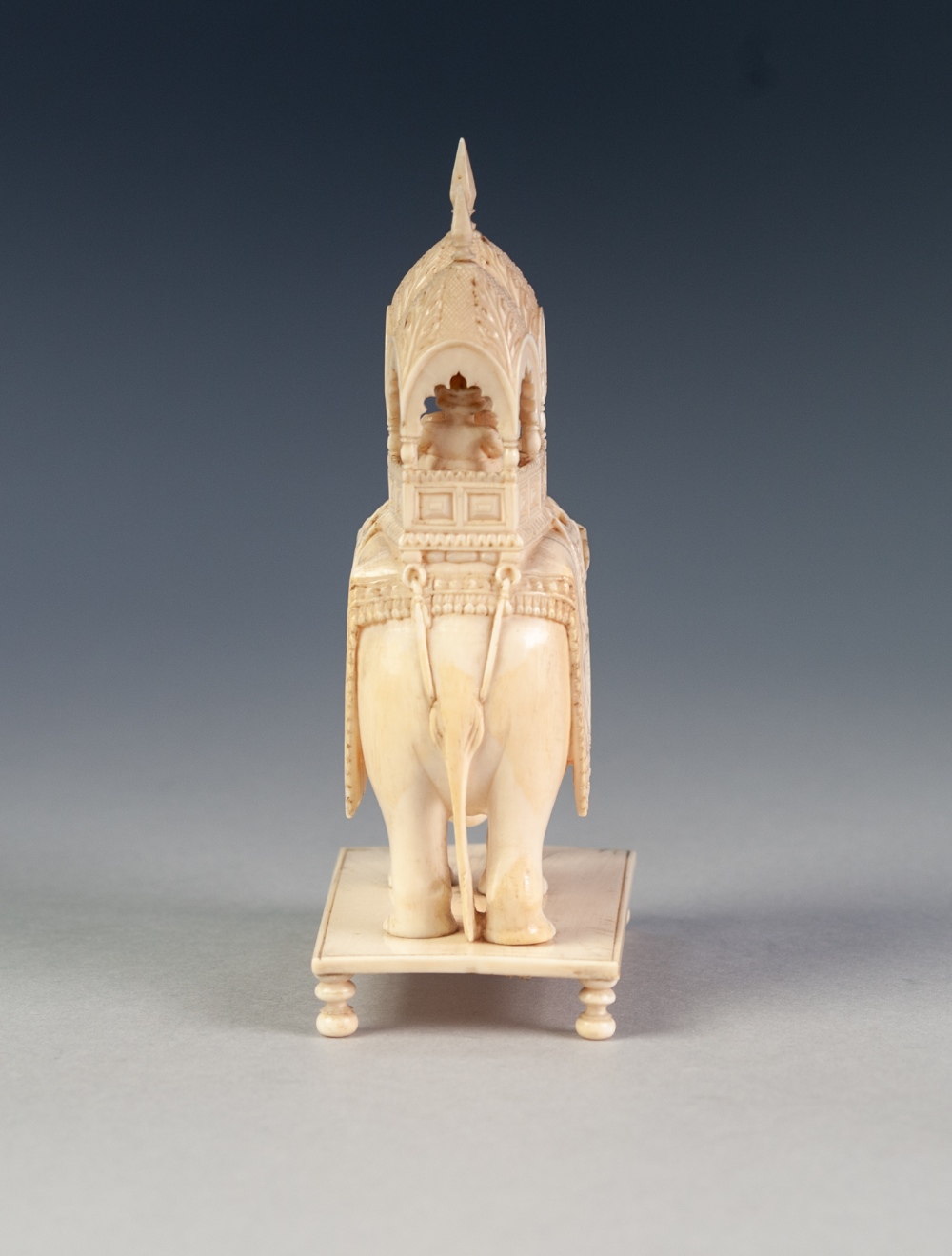 EARLY TWENTIETH CENTURY INDIAN CARVED IVORY GROUP OF FIGURES IN A HOWDAH ON A CEREMONIAL ELEPHANT, - Image 4 of 7