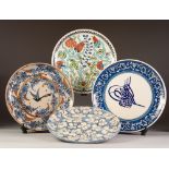 MODERN IZNIK INSPIRED TURKISH HAND PAINTED POTTERY WALL PLAQUE, 12" (30.5cm) diameter, together with