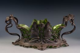 PROBABLY W.M.F, SILVERED METAL TWO HANDLED DISH STAND WITH GREEN GLASS LINER IN THE ART NOUVEAU