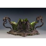 PROBABLY W.M.F, SILVERED METAL TWO HANDLED DISH STAND WITH GREEN GLASS LINER IN THE ART NOUVEAU